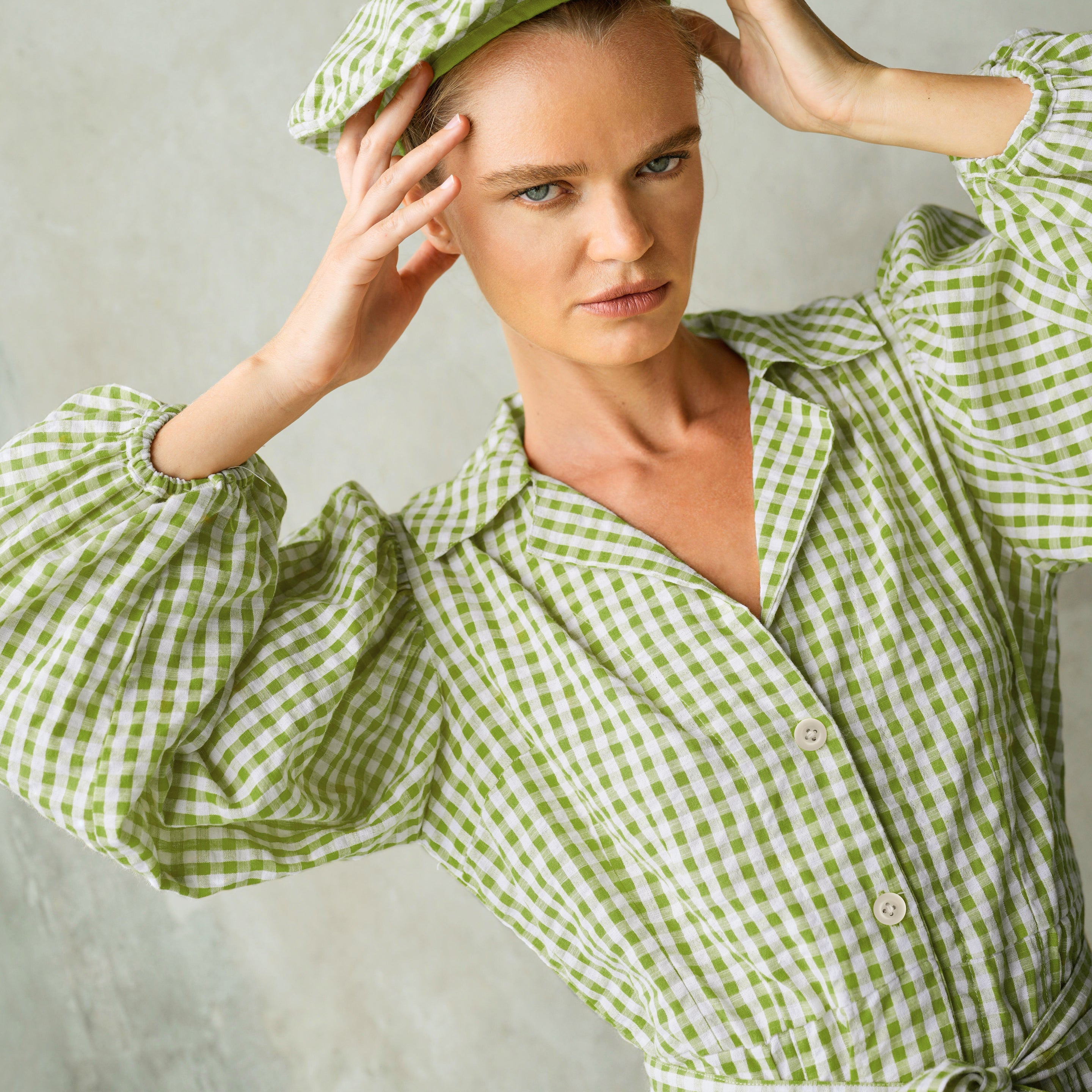 THE MEGHAN GINGHAM MINI DRESS IN OLIVE GREEN