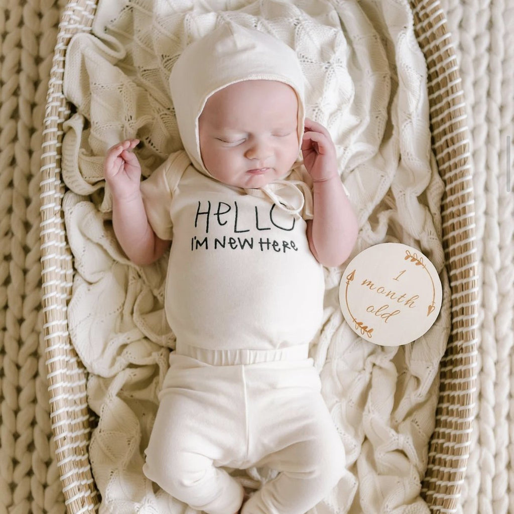 HELLO I'M NEW HERE ORGANIC BABY BODYSUIT