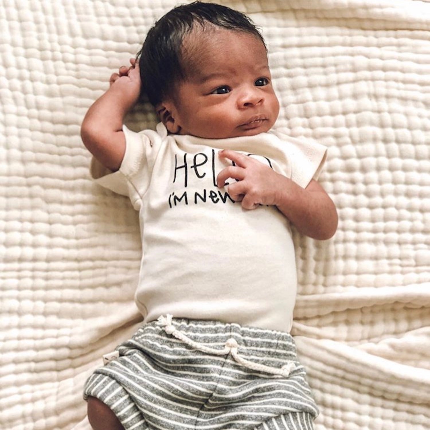 HELLO I'M NEW HERE ORGANIC BABY BODYSUIT